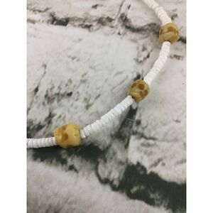 Puka Shell Necklace With Carved Skull Beads Cici Spooky Halloween